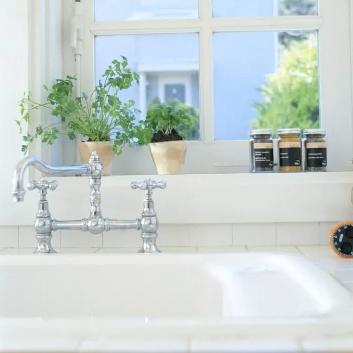 Stainless-steel kitchen sink and tap (stock photo)